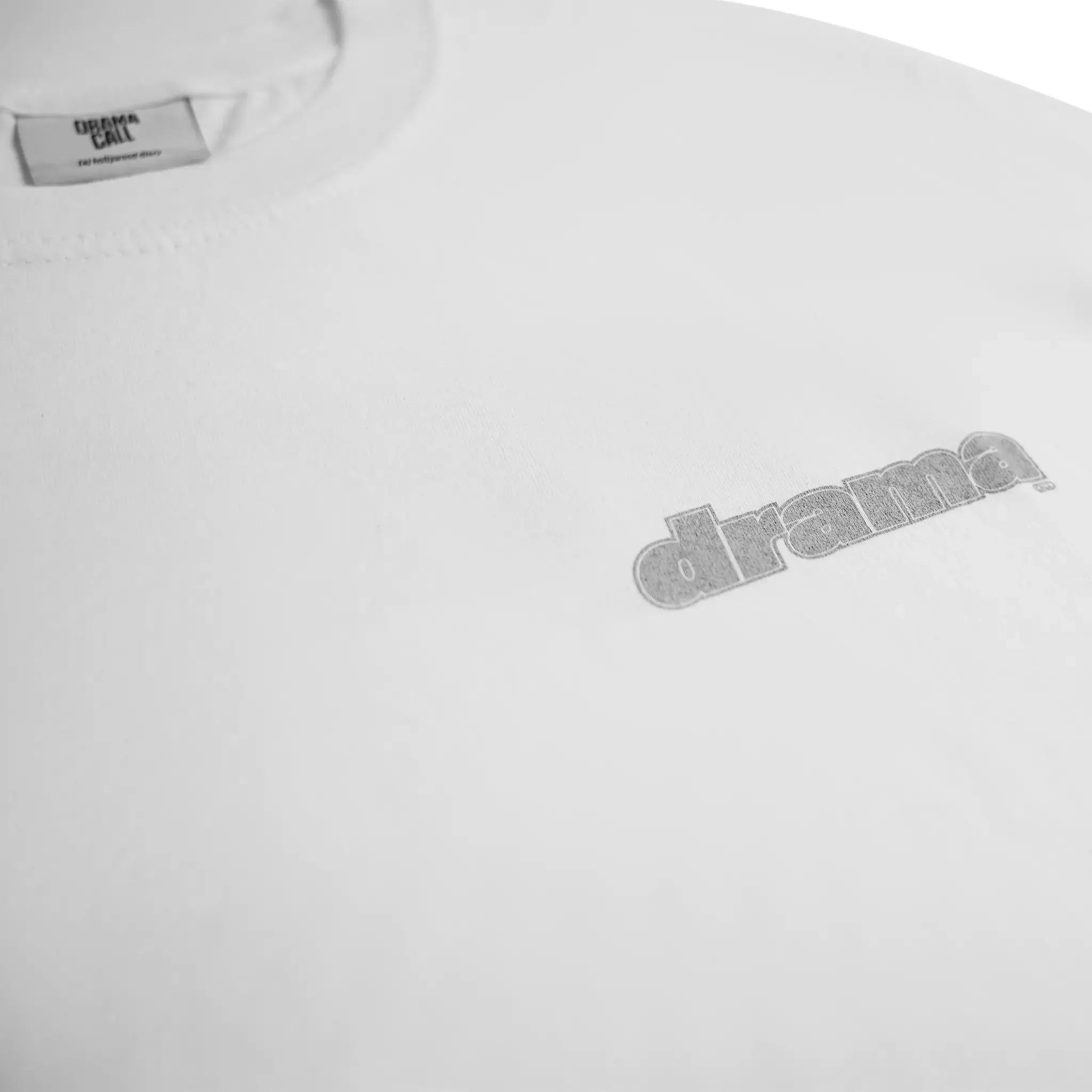 Front logo view of Drama Call Staple Staff White T Shirt
